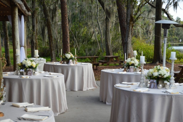 Country chic wedding reception centerpieces of white.