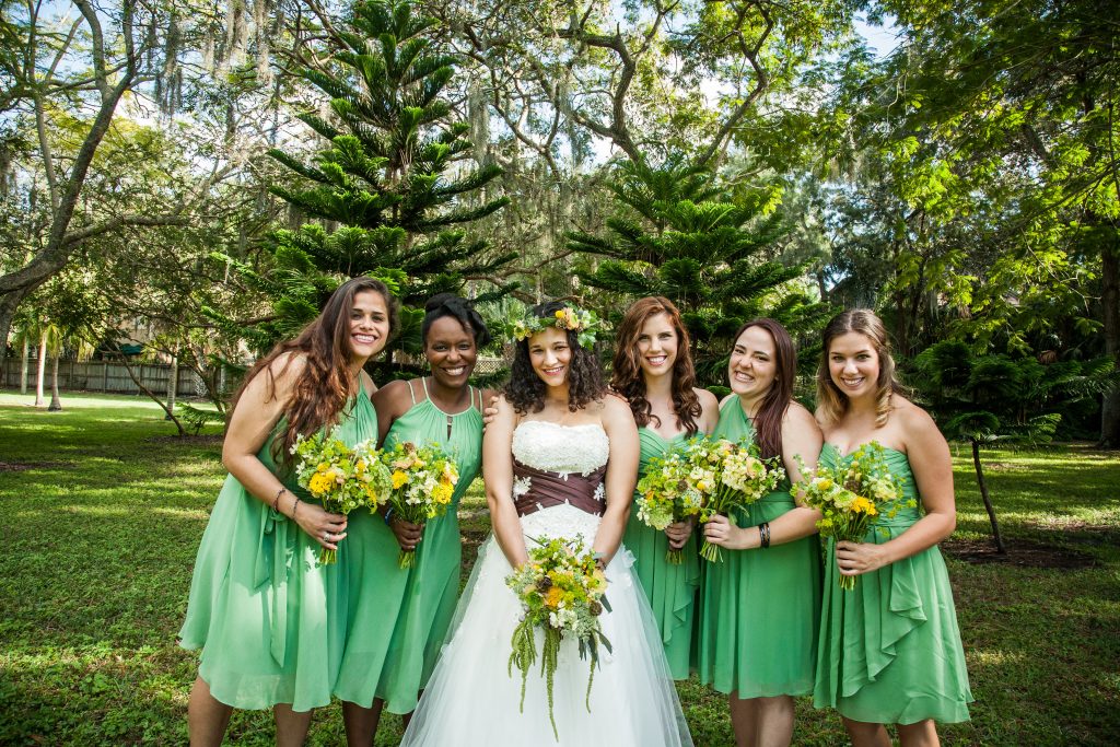 Green and yellow bridal and bridesmaid wild flower bouquets.