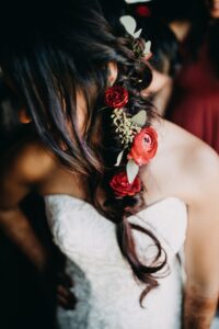 Red ranunculus and eucalyptus bridal hair flowers in St. Petersburg, Florida.
