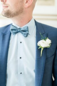 White lisianthus groom's bouttoniere in Tampa, Florida.