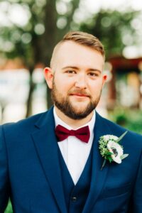White anemone boutonniere with seeded eucalyptus in Tampa, Florida.