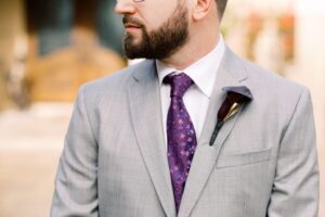 Eggplant calla lily groom's boutonniere in St. Petersburg, Florida.
