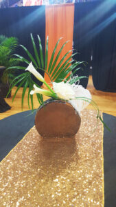 Modern white cocktail table centerpiece for charity gala.