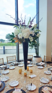 Modern white, gold and black elevated centerpiece for Florida Orchestra Gala.