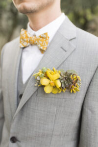 Succulent and yellow flower pocket square for groom in St. Petersburg, Florida.