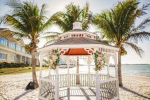 Organic pastel gazebo flowers for beach wedding ceremony at Isla del Sol in St. Petersburg, Florida.