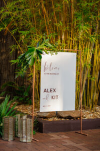 Tropical greenery corner piece for welcome sign to wedding reception at Nova 535 in St. Petersburg, Florida.