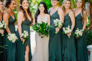 All tropical greenery bridal bouquet and all white bridesmaid bouquets in St. Petersburg, Florida.