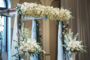 Grand and organic all white chuppah at Museum of Fine Arts in St. Petersburg, Florida.