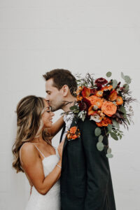 Fall orange and merlot organic bridal bouquet in St. Petersburg, Florida.