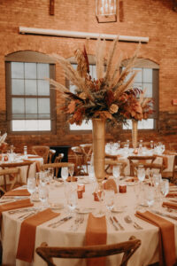 Fall inspired boho elevated centerpiece with pampas grass at Armature Works in Tampa, Florida.