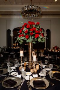Red rose elevated centerpiece at wedding reception in St. Petersburg, Florida.