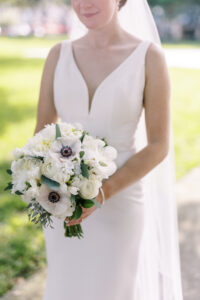 Classic white bridal bouquet with anemones and peonies in St. Petersburg, Florida.