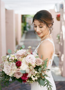 Romantic neutral colors with a pop of dark pink bridal bouquet at the Vinoy in St. Petersburg, Florida.