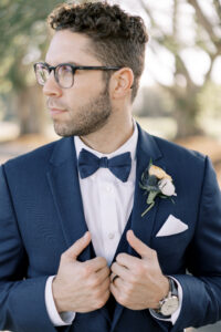 Spring ranunculus and thistle boutonniere in St. Petersburg, Florida.