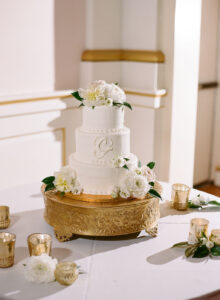 Romantic white cake flowers with peony at wedding reception at Museum of Fine Arts in St. Petersburg, Florida