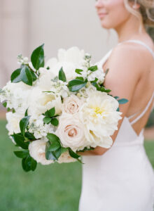 Romantic white bridal bouquet with emerald green foliage in St. Petersburg, Florida.