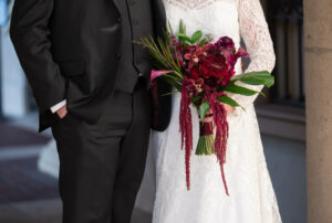 Burgandy and merlot bridal bouquet with hanging amaranthus in St. Petersburg, Florida.